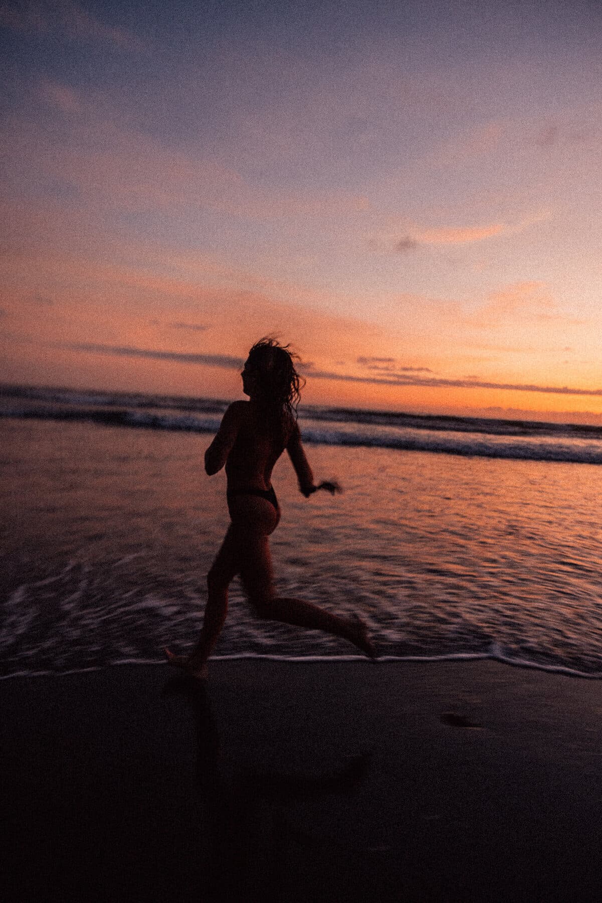 Silhouette on a Bali beach at dusk