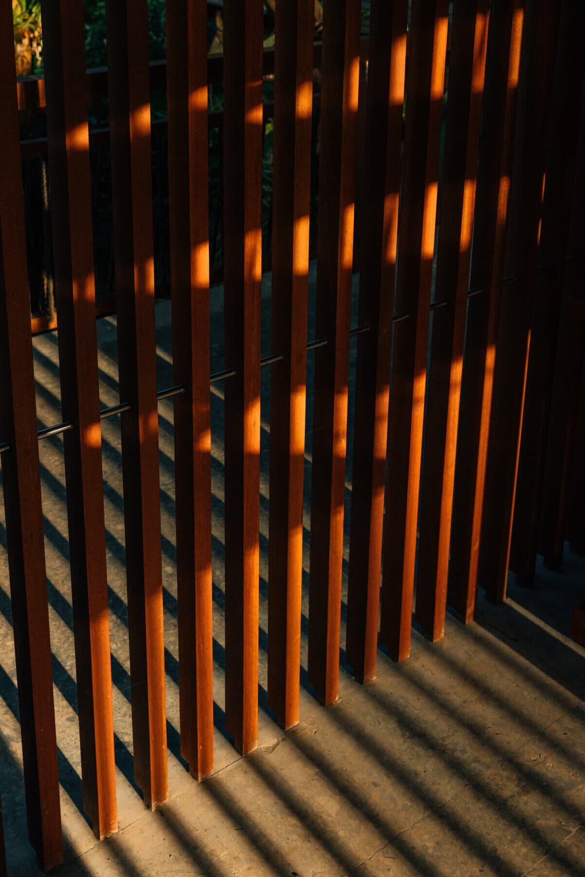 Wood slats with warm evening light at resort